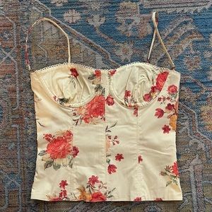 Danielle Bernstein yellow floral corset top